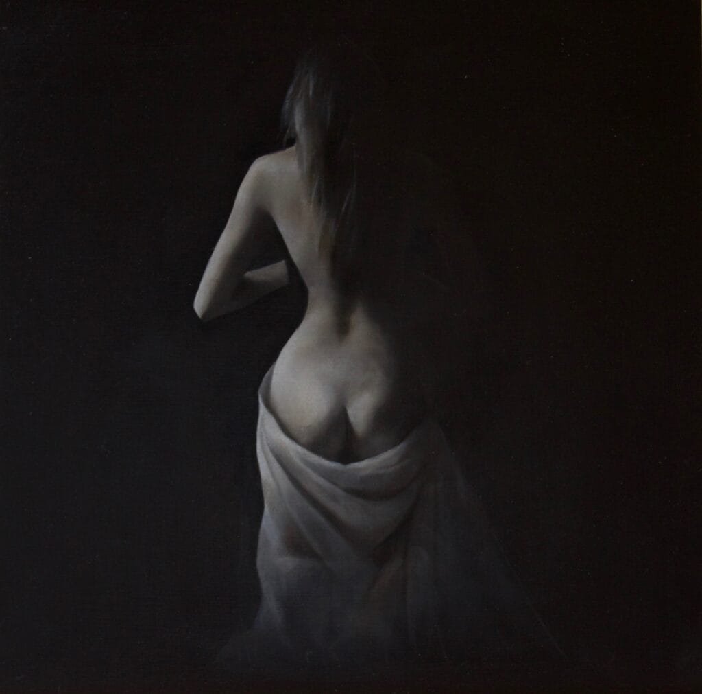 Figure draped in soft fabric