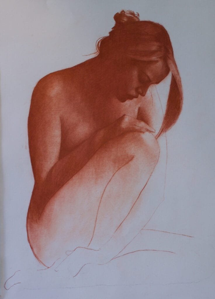 Figure in red chalk, seated pose.