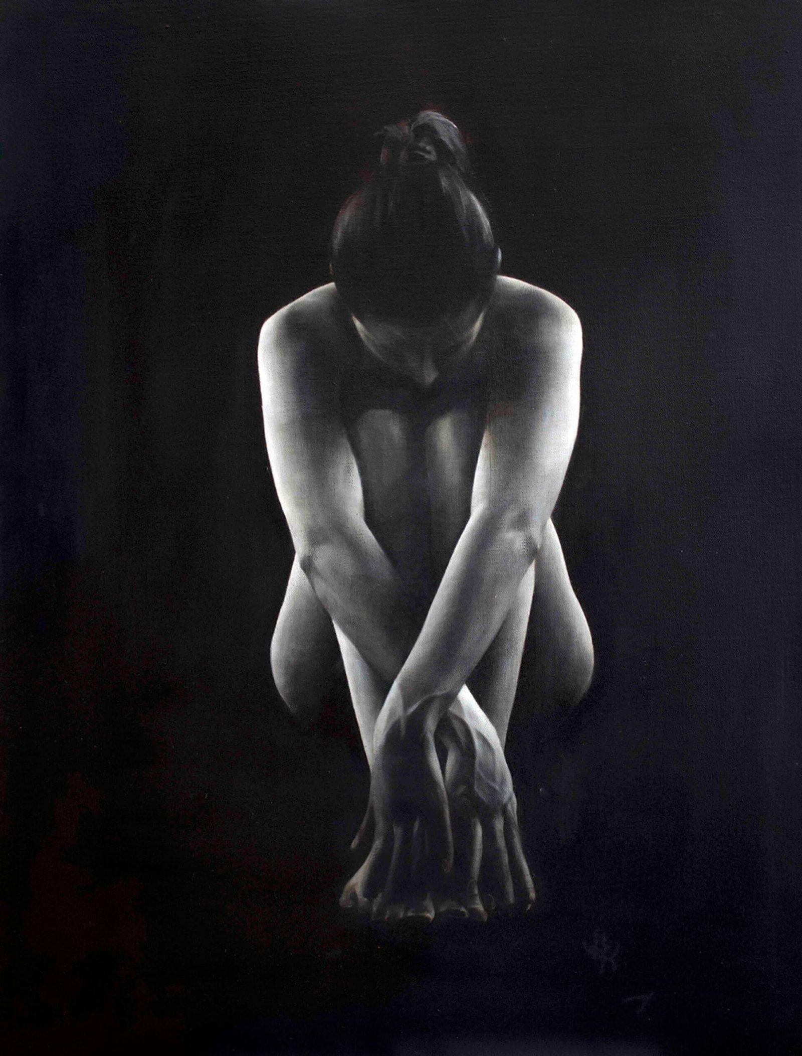 Figure in a contemplative pose.