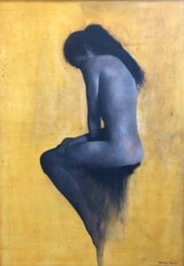 A painting of a nude woman sitting in profile with head bowed and arms resting on her knees, against a golden yellow background. This contemplative figure is softly shaded—one of our evocative figurative oil paintings for sale online.